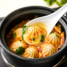 Soup Dumplings in Tom Yum Sauce - One Happy Bite