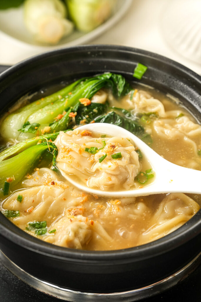 garnish and serve hot wonton soup