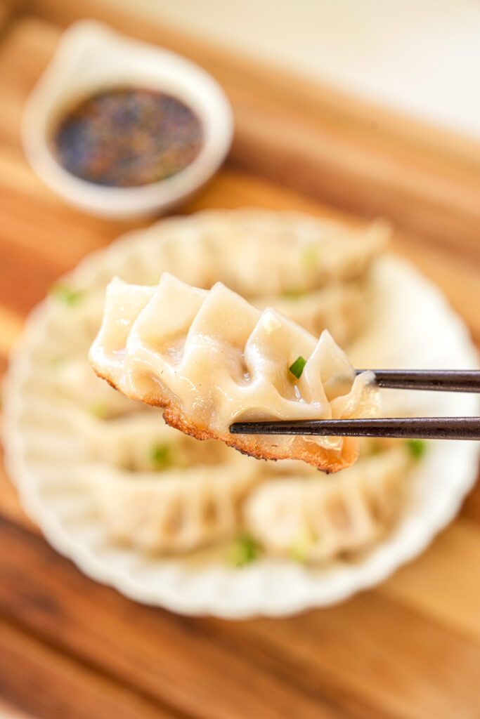 making the juiciest dumplings using scallion ginger infused water