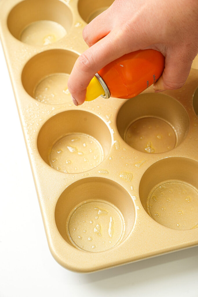 spray the muffin tin with cooking spray for jalapeno popper wonton cups