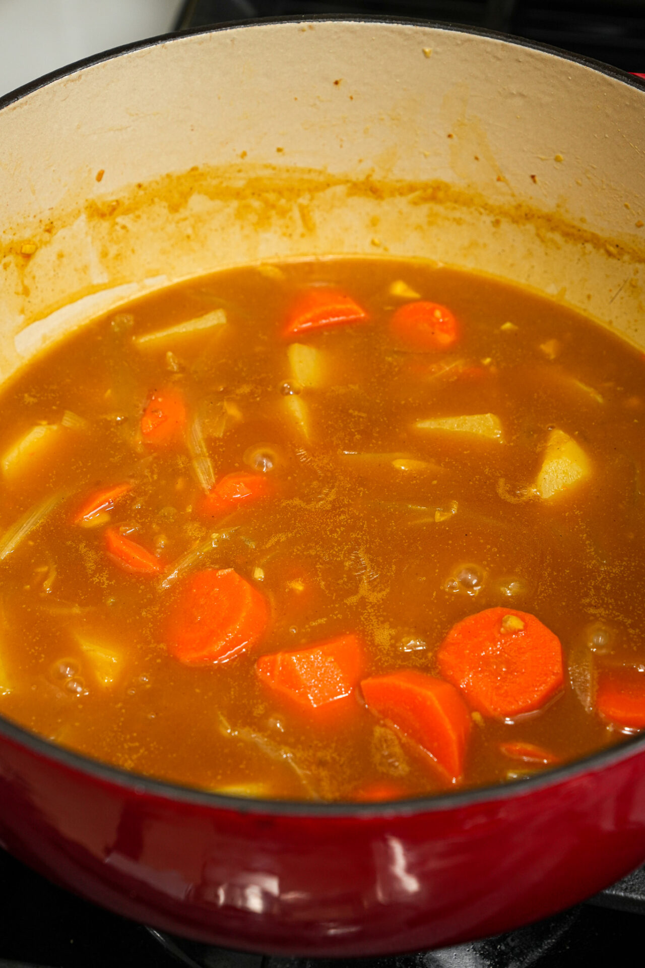 simmer chicken katsu curry until sauce is thickened