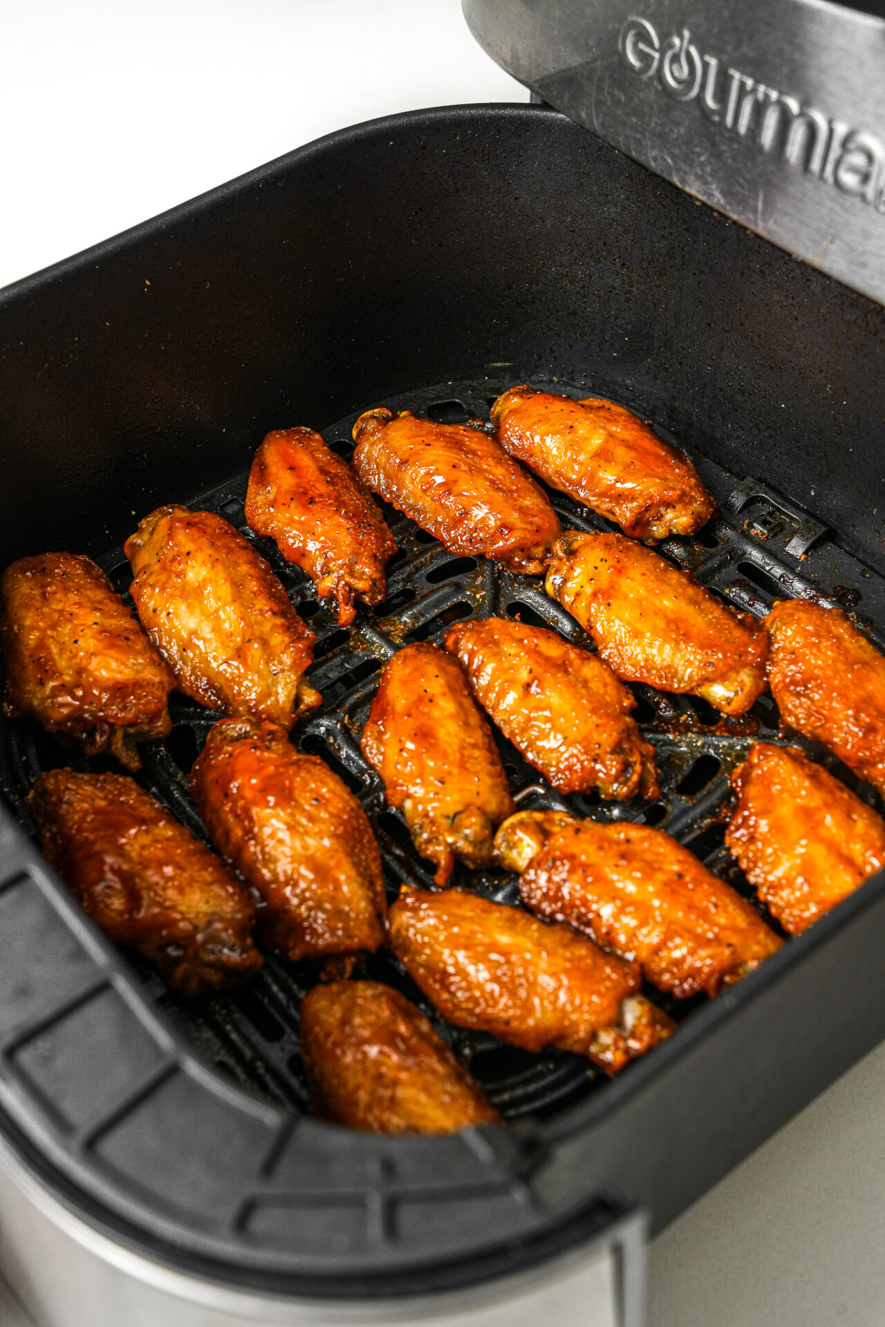 cook sweet and sour chicken wings in an air fryer for another 2 minutes at 400 degrees to get the perfect glaze