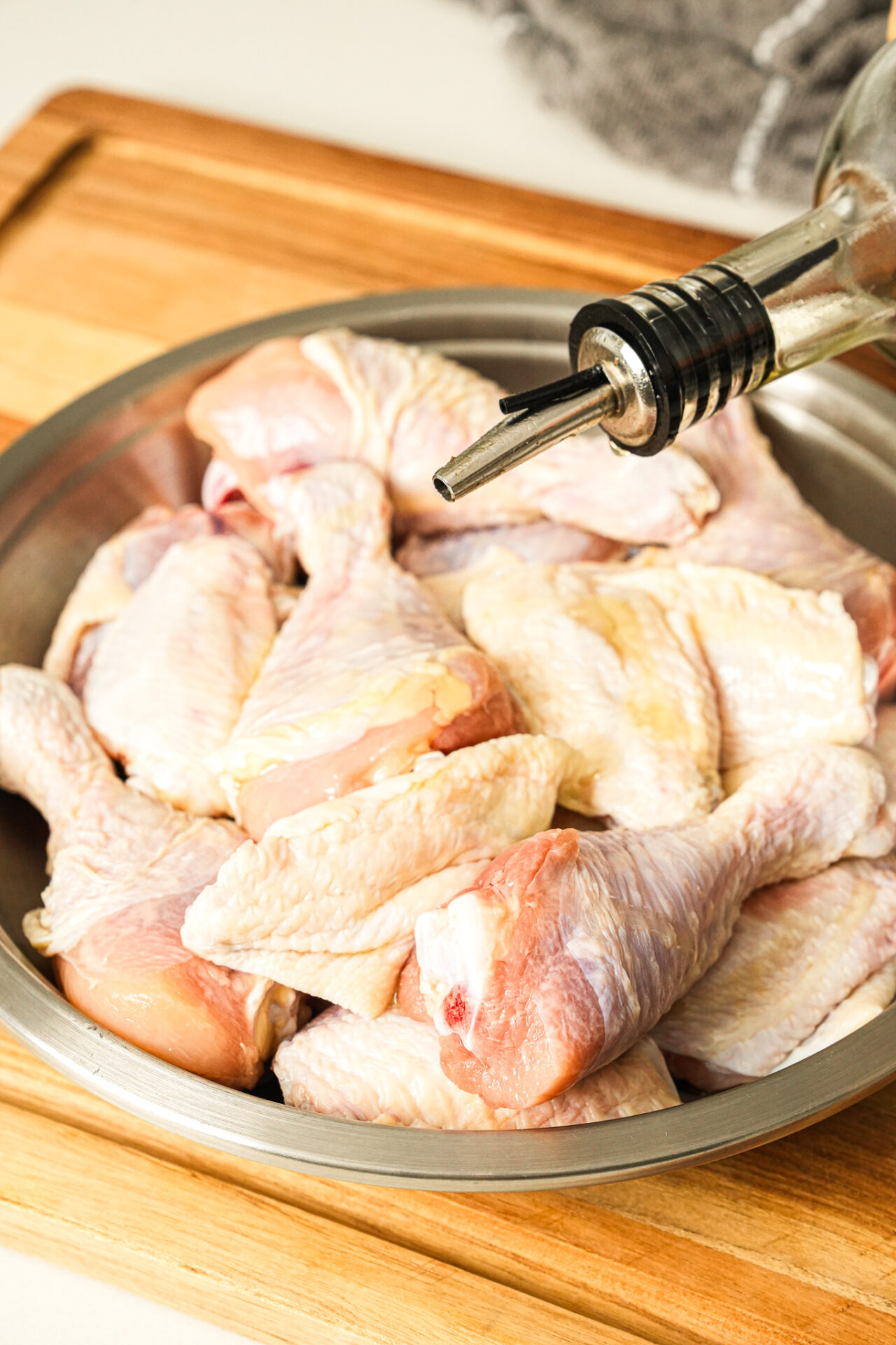 coat chicken wings with neutral oil for Air Fryer Gochujang Honey Chicken Wings