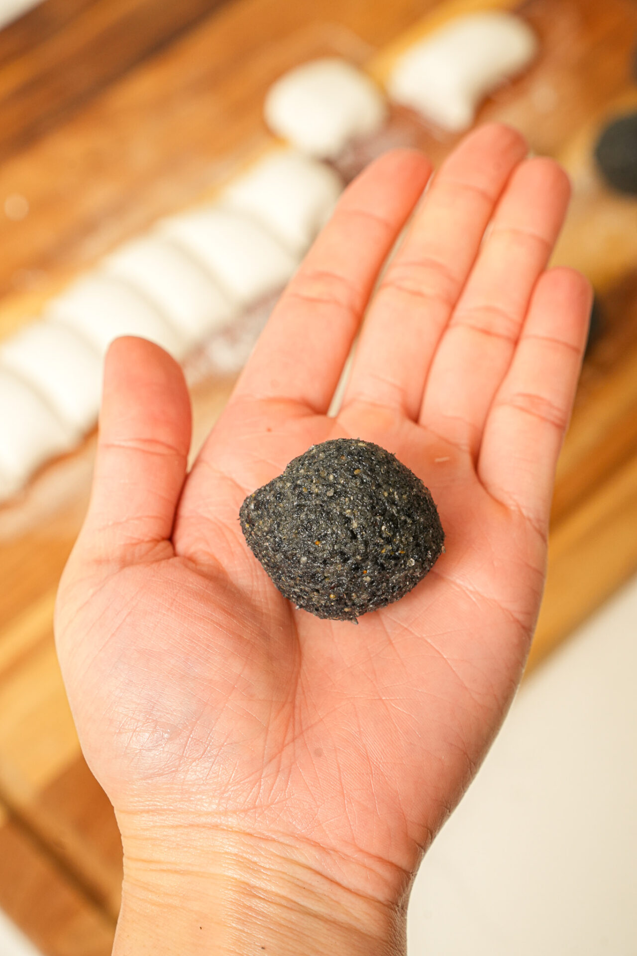 roll black sesame filling into a ball