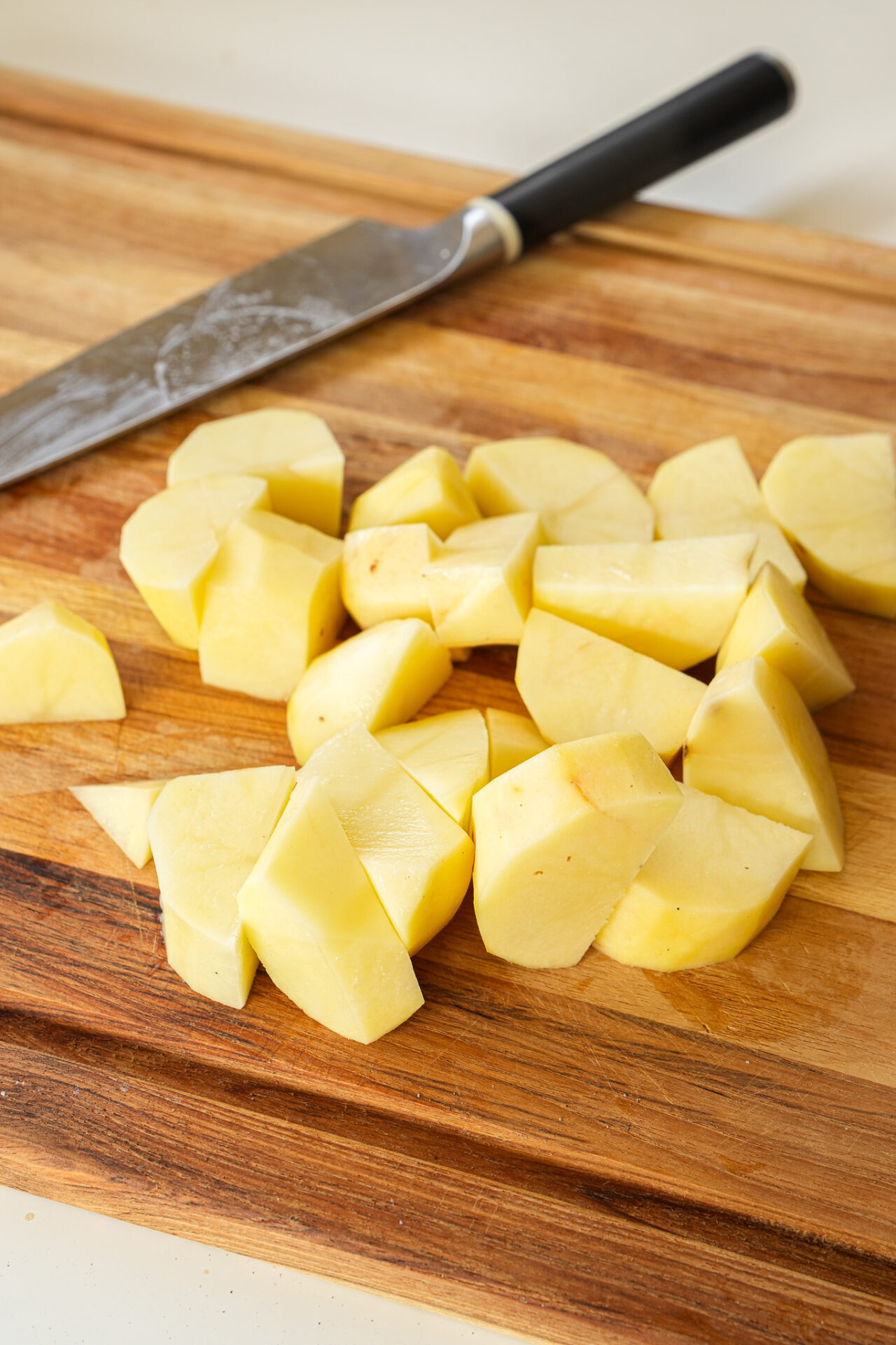 peel and chop the potatoes for chili oil potato noodles