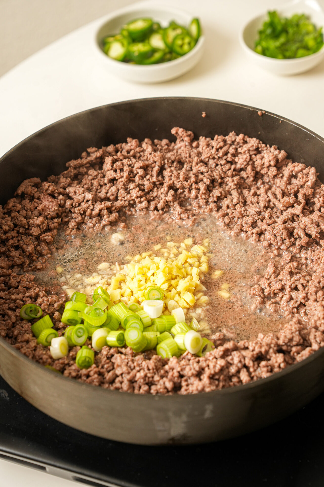 Add garlic, ginger, and green onion for mapo tofu nachos