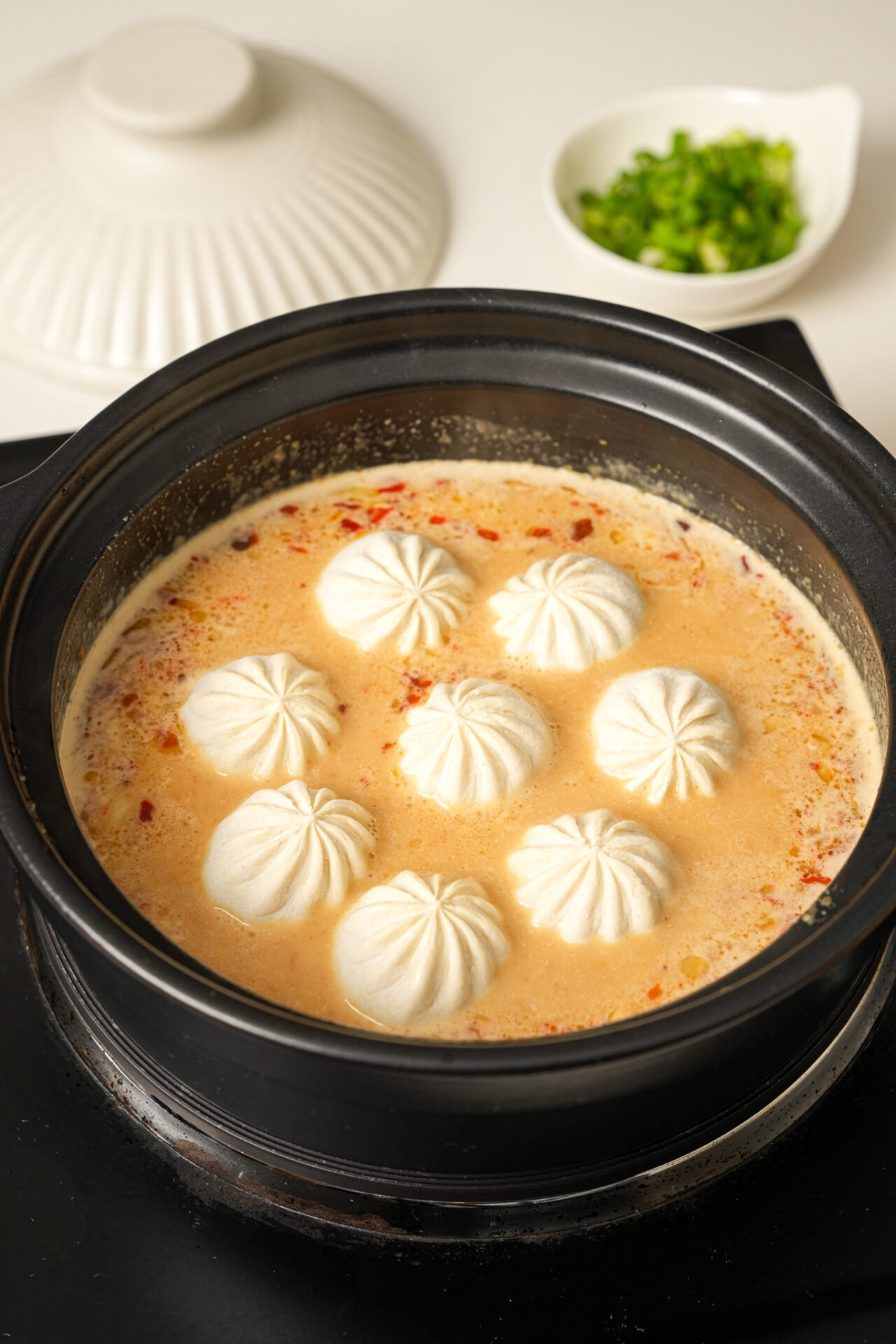 soup dumplings in satay sauce