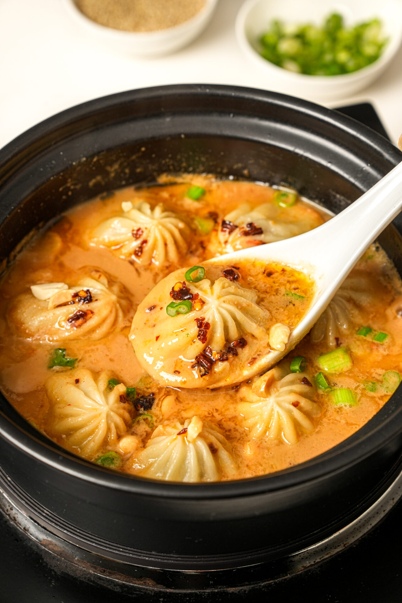 soup dumplings in satay sauce