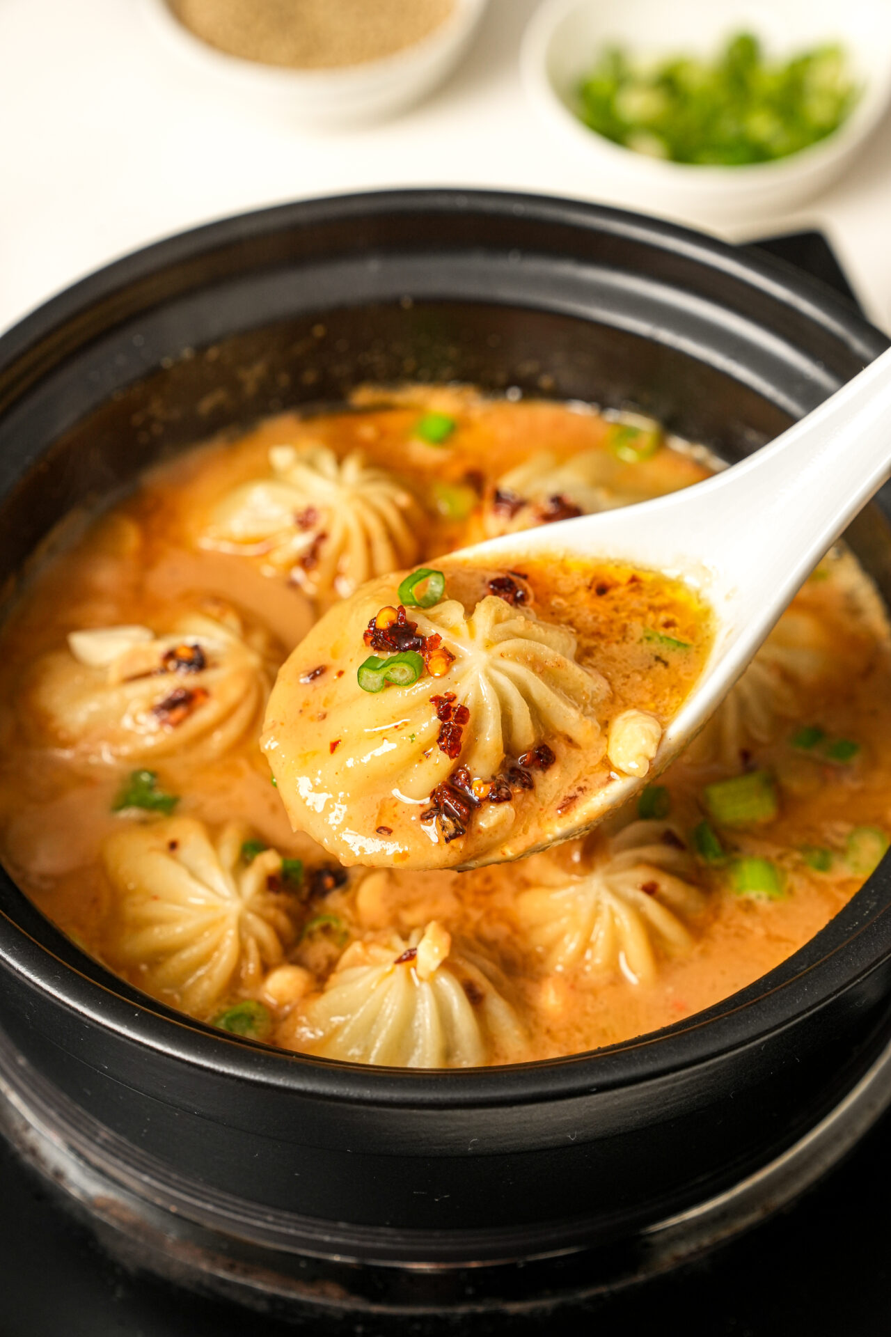 soup dumplings in satay sauce