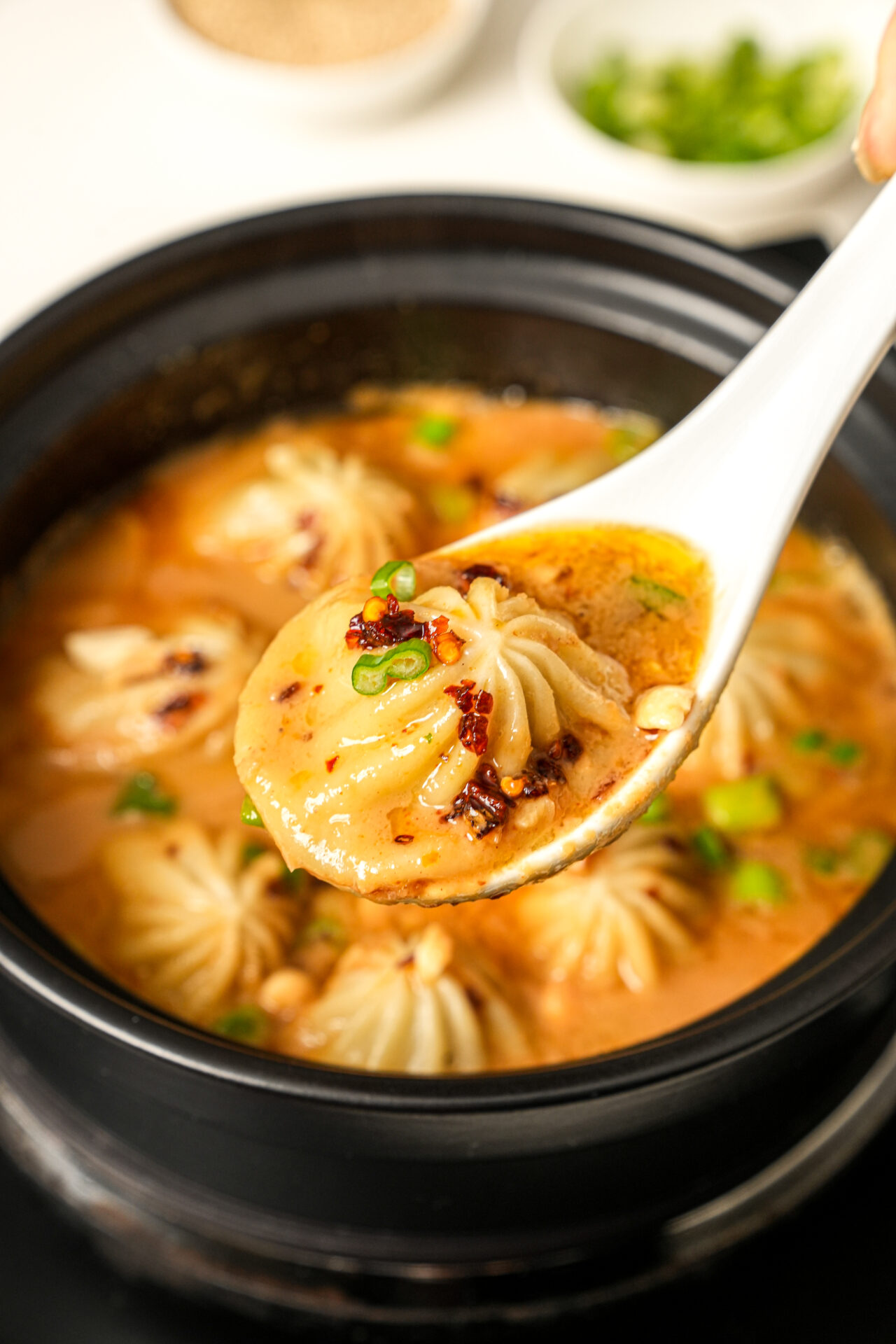 soup dumplings in satay sauce