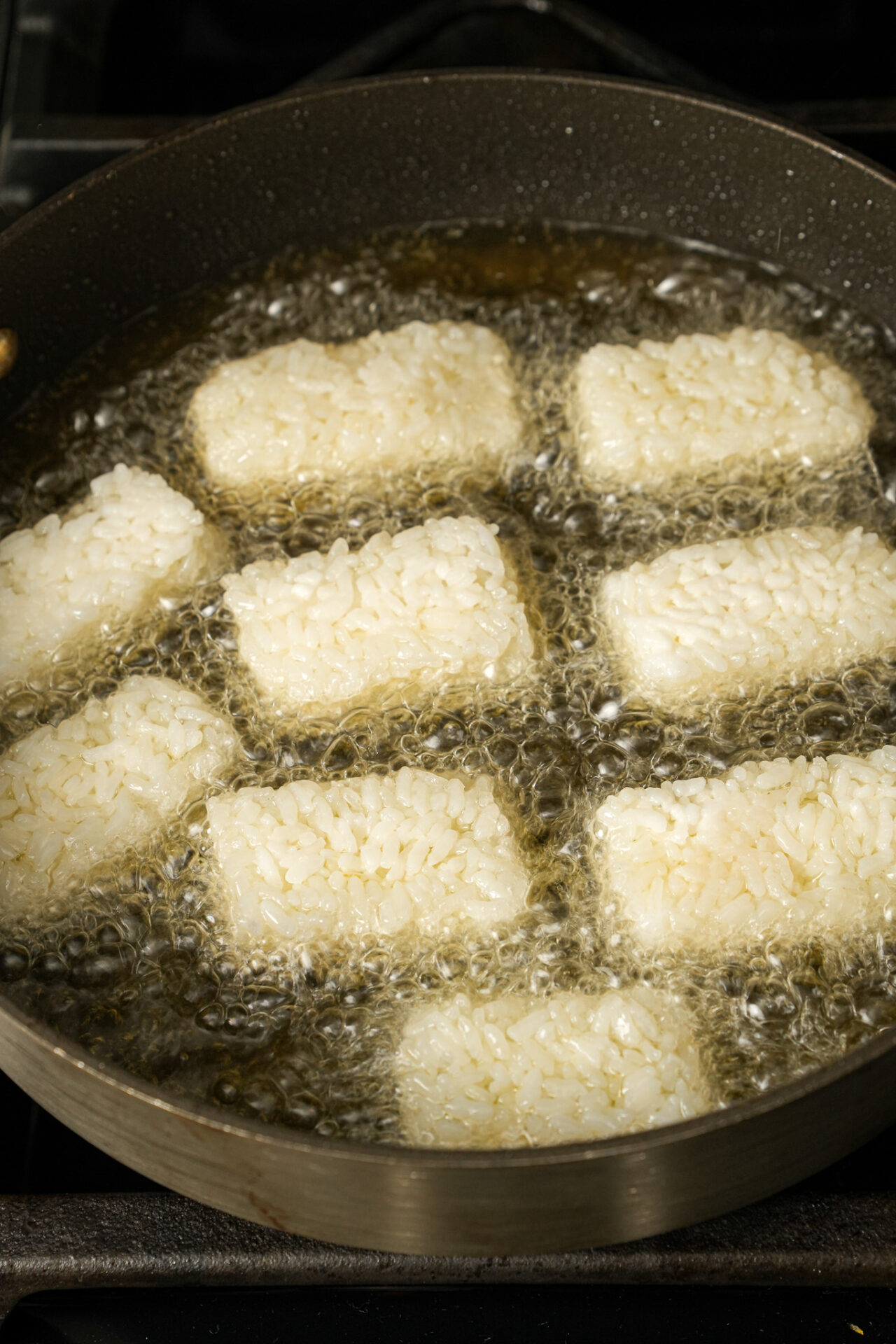 fry sushi rice in oil to make crispy rice