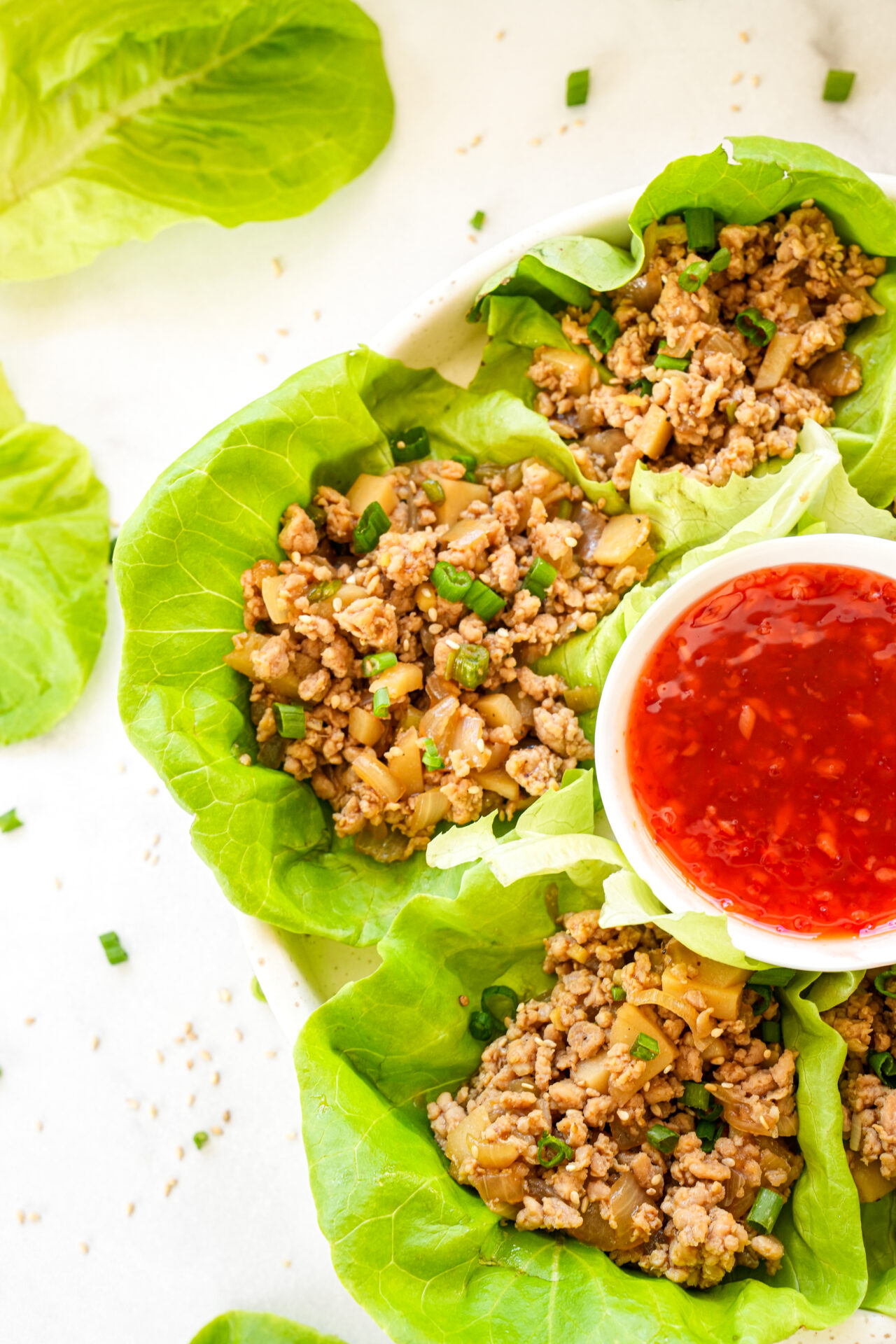 healthy chicken lettuce wraps with thai sweet chili sauce