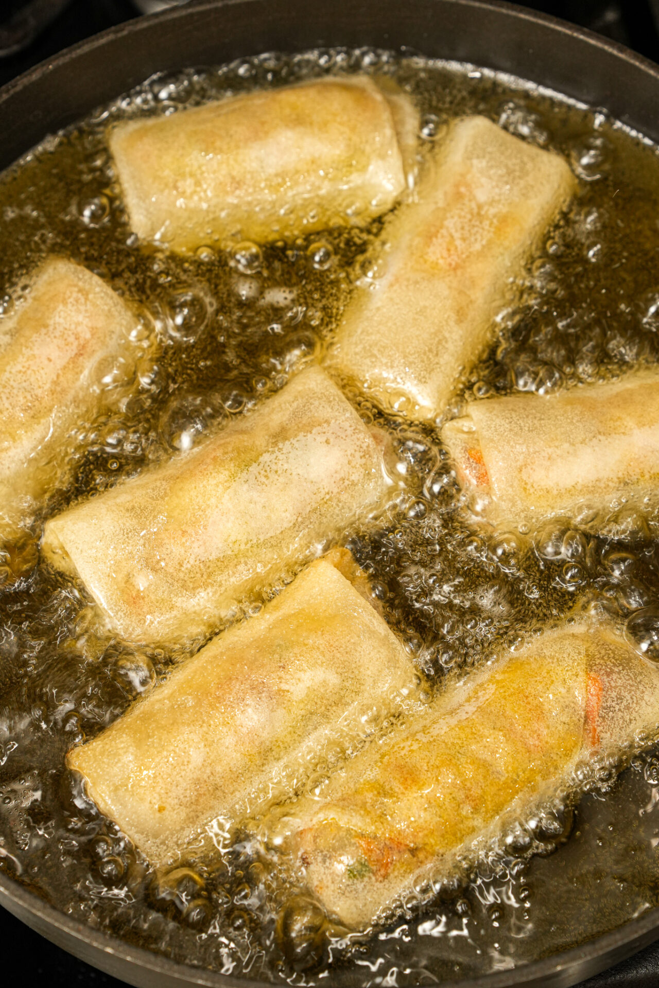 Frying Crispy Pork and Cabbage Egg Rolls