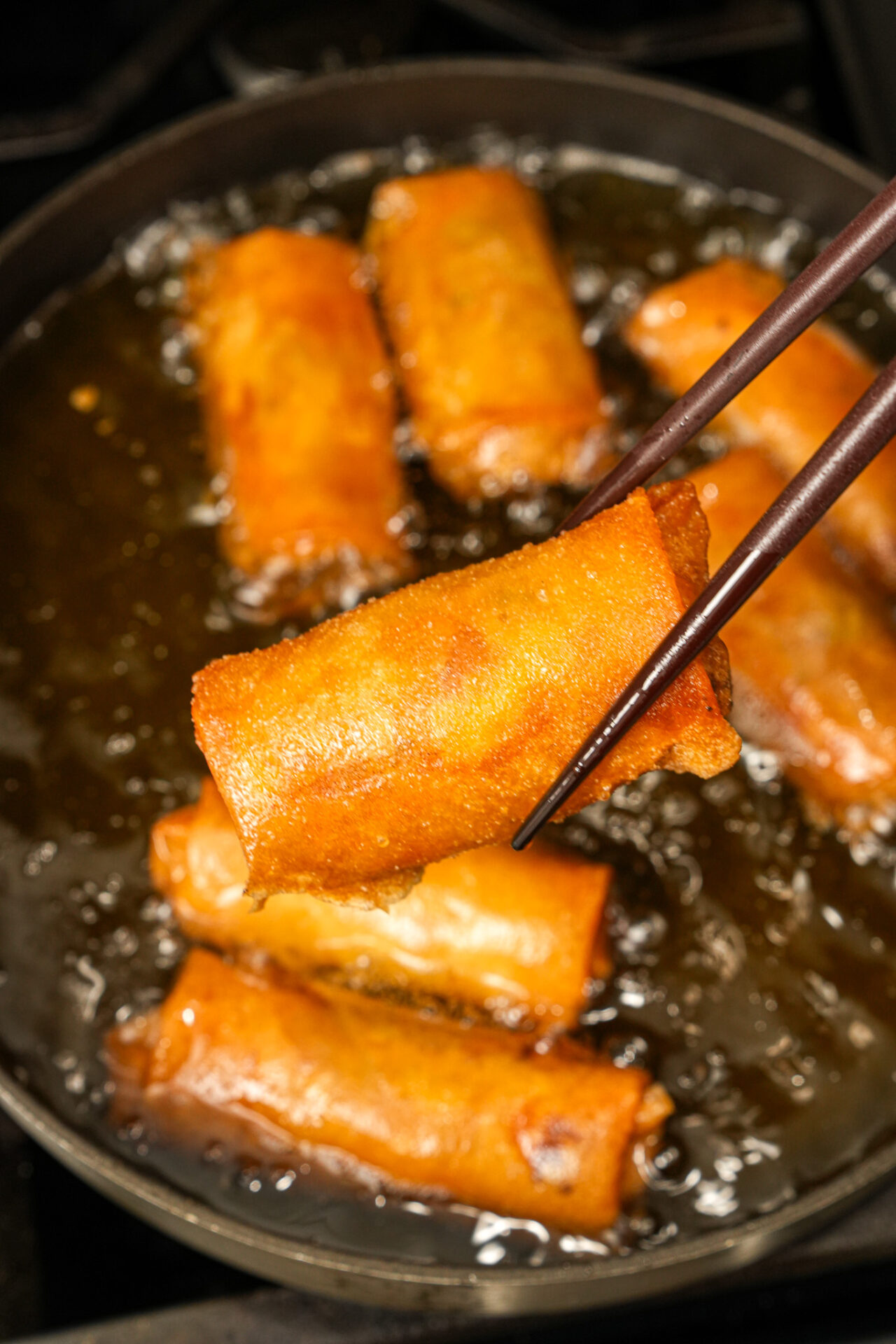 Frying Crispy Pork and Cabbage Egg Rolls